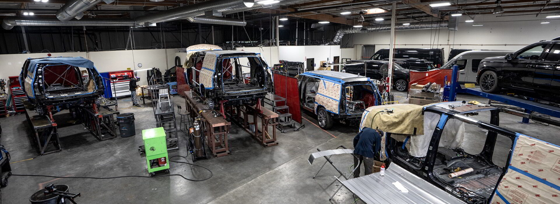 In-House Vehicle Stretching and Structural Fabrication of Becker Cadillac Escalade ESVs (Image 2)